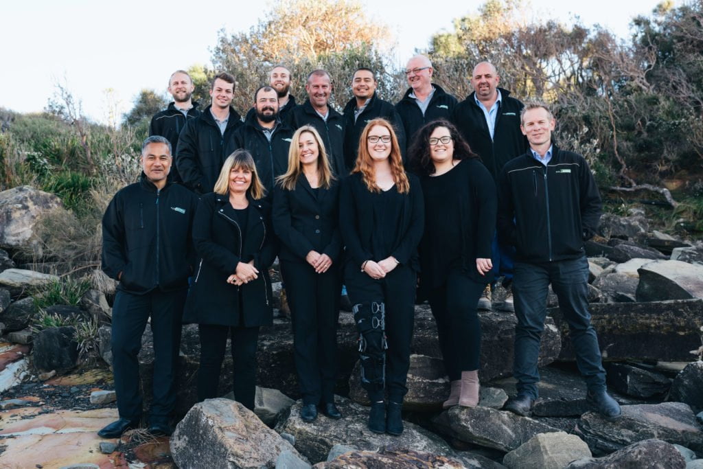 Fluid Plumbing Team posing in a group photo