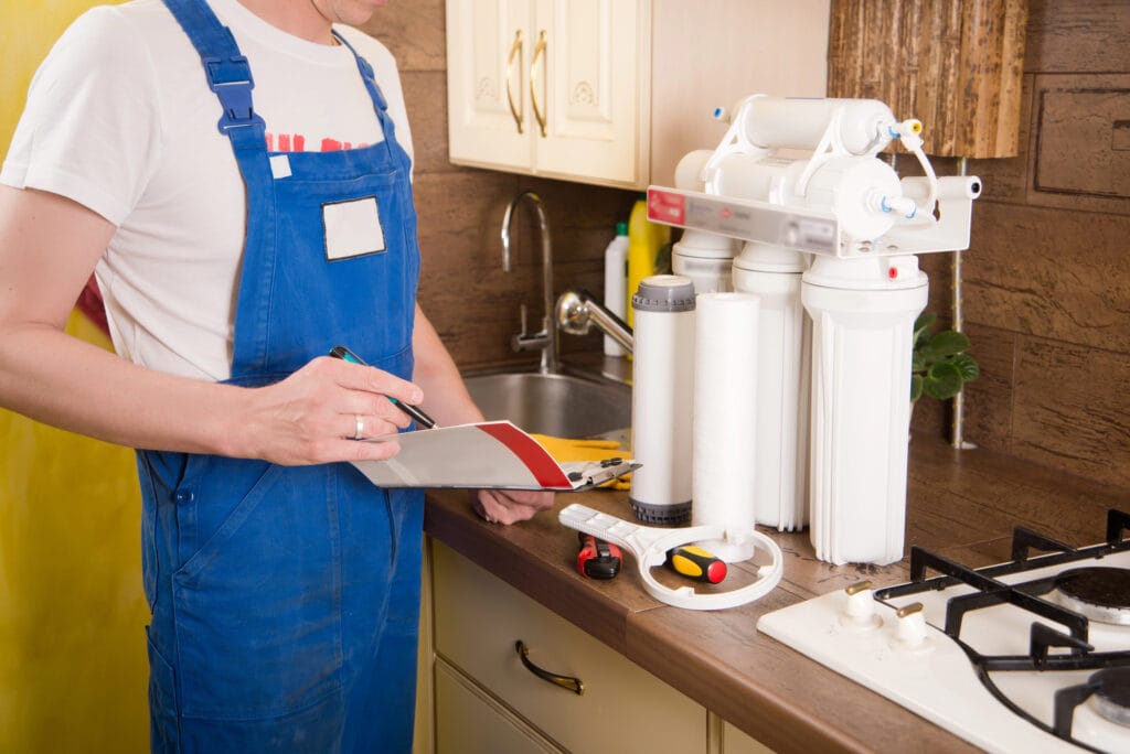 Plumber change the water filter